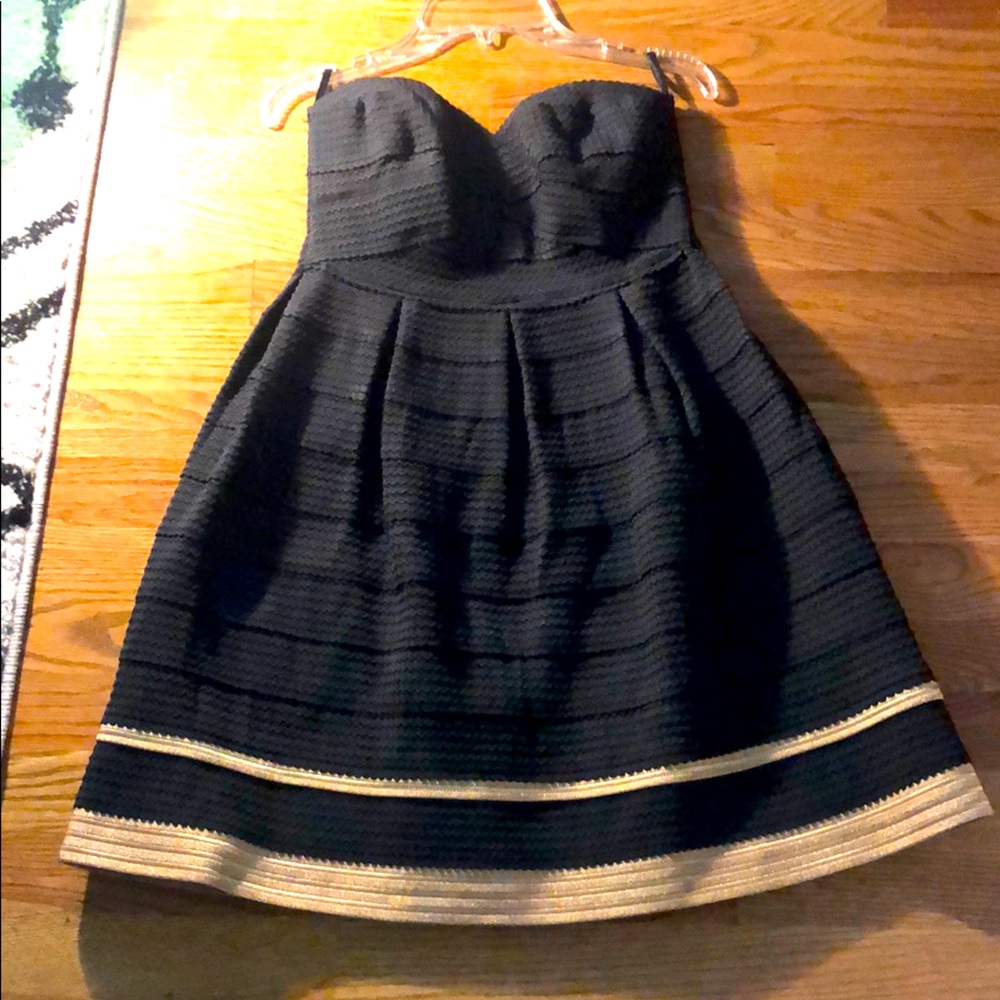 Adorable black and gold swing dress